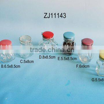 glass spice jar with colored ceramic folding top lid