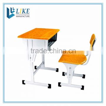 Combination of wood and steel school desks and chairs