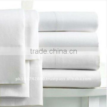 white cotton bed sheet