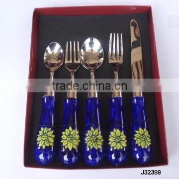 steel cutlery set with blue ceramic handle with knob at end in mirror polish finish
