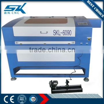 6090 rotary leather fabric laser cutting machine wood pen laser engraving machine for glass bottle cup ball carving                        
                                                                                Supplier's Choice
