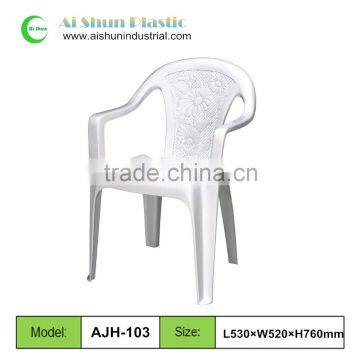 Outdoor white plastic stacking chairs