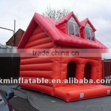 red inflatable house bouncer