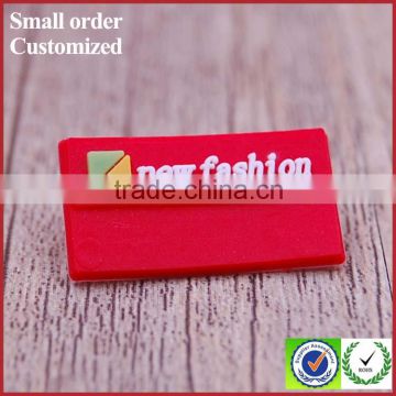 Heat transfer soft embossed pvc silicone label with white logo