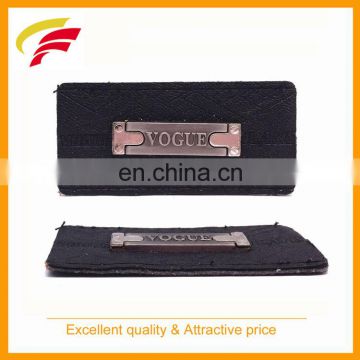 PU leather with metal labels for jeans garment and bags